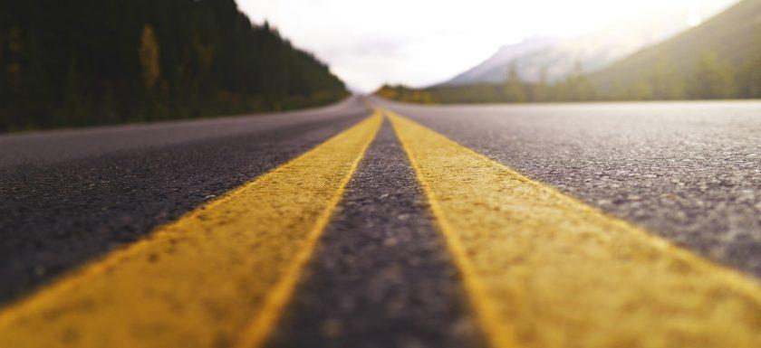 long open road, summer road trip, drowsy driving dangers